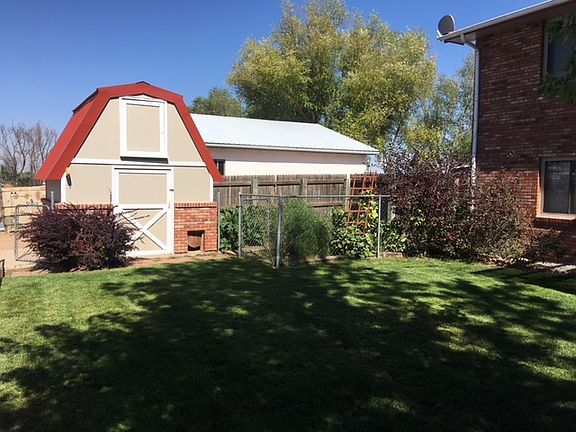 2 story shed in backyard