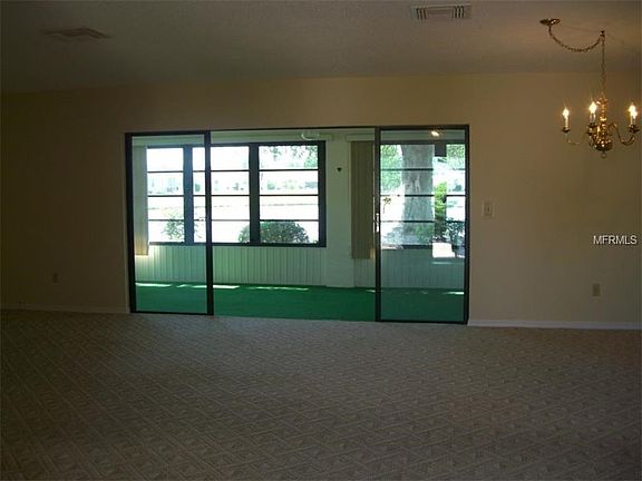 WALKING THROUGH FRONT DOOR INTO GREAT ROOM AND THAT VIEW