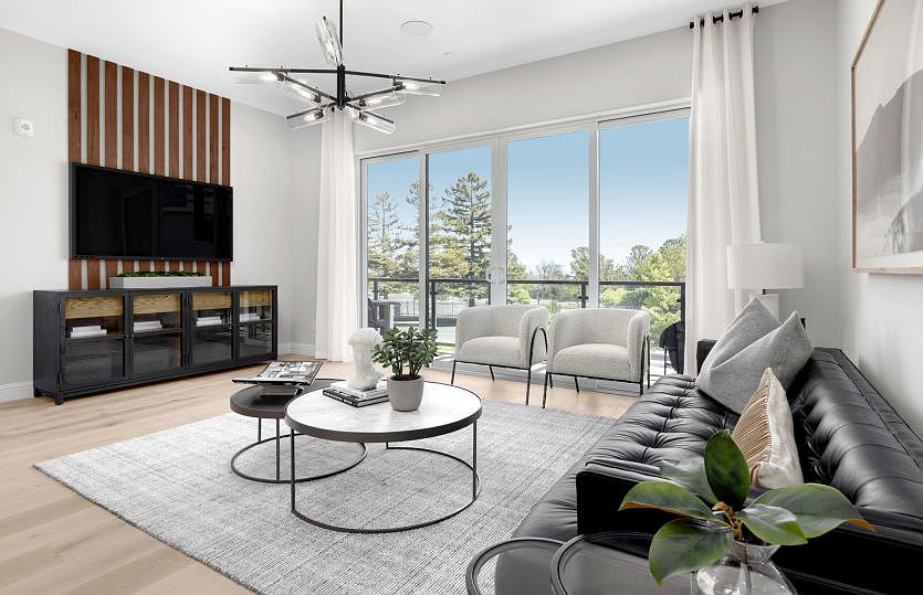 Light filled gathering room with balcony access