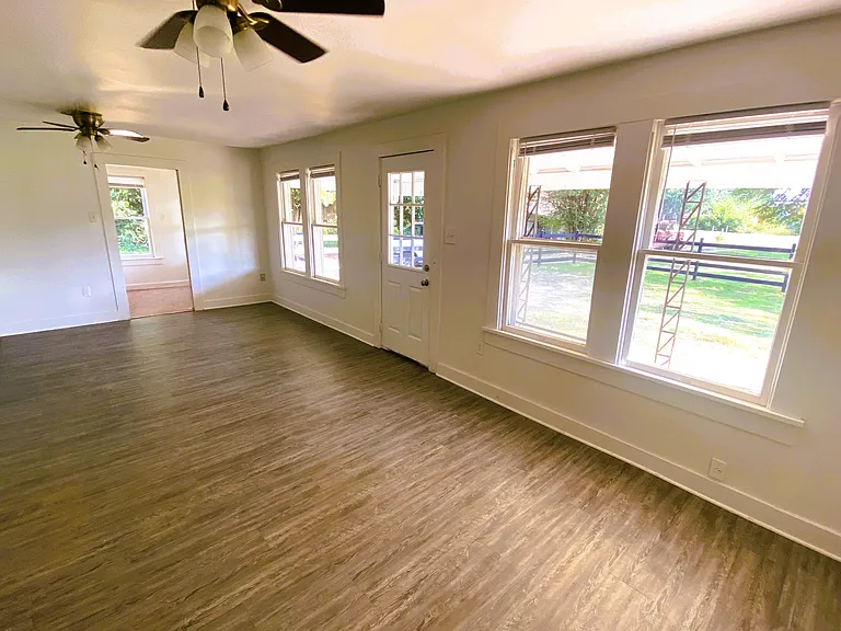 Livingroom with 3rd bedroom/office to the left side