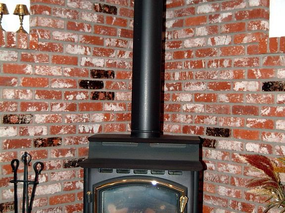 Heating Stove fireplace but not needed to keep warm!  Just cozy!