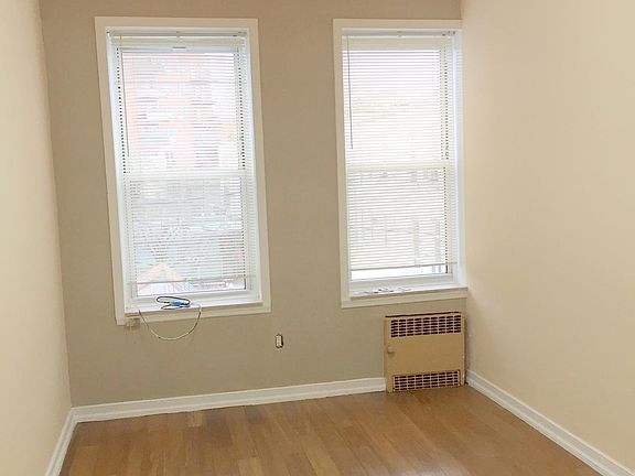 bedroom with large mirror closet