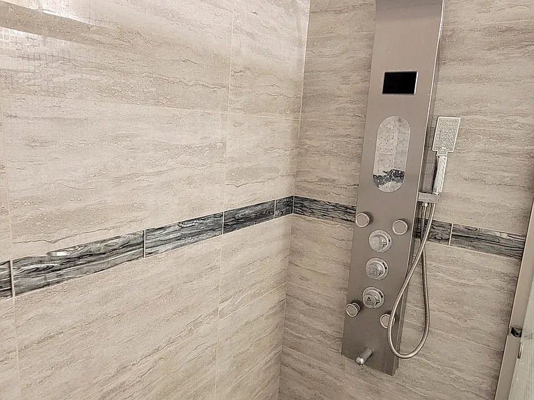 Choose one or a combination of two of the five shower settings.
Water temperature and shower timer built in.
This shower is amazing.