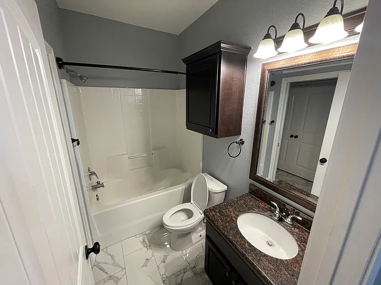 3317 Cullen Trl — Photo 11