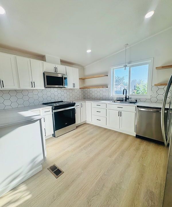 1st image of 692 NW 15th St
