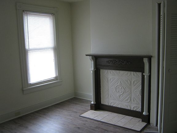 One of four bedrooms (three have mantels like this one)
