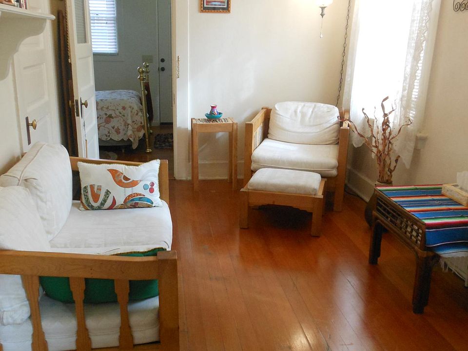 Den; open door leads to Bedroom