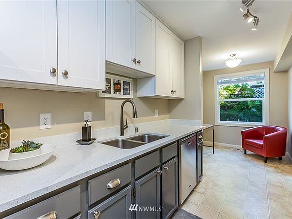 Updated kitchen with quartz countertops.