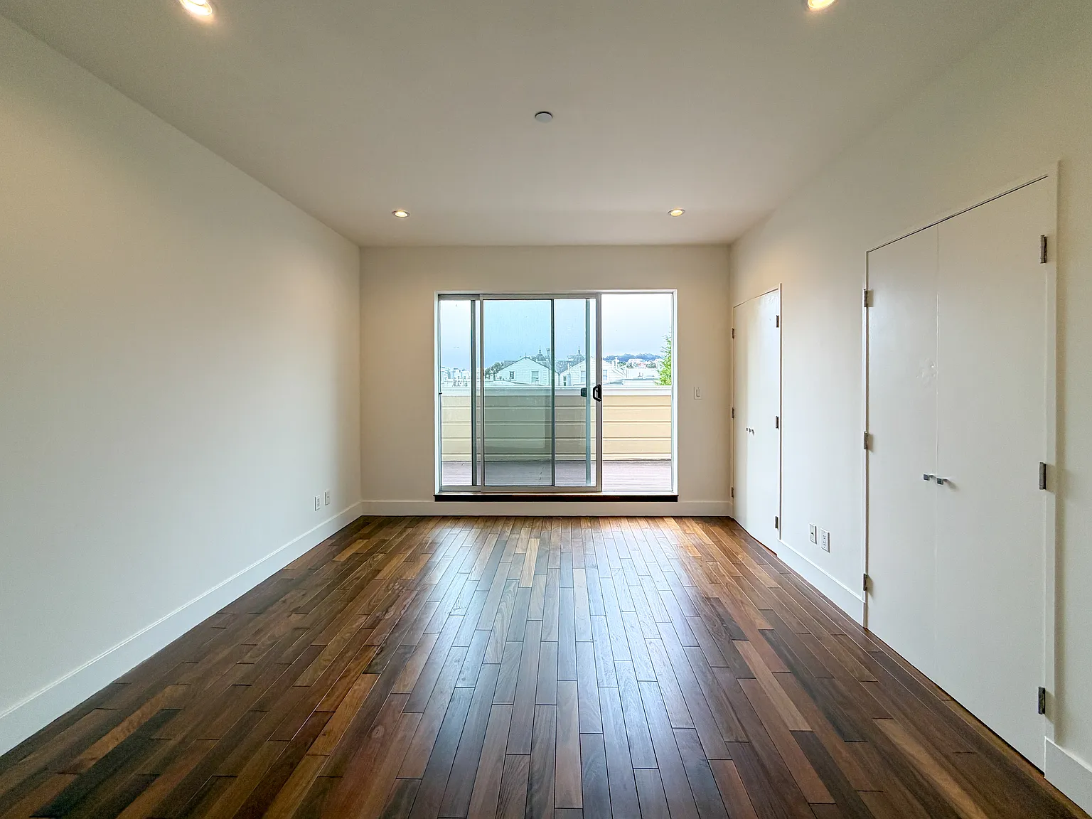 Spacious 2BR/2BA with Private Deck, Parking & In-Unit Laundry — Photo 4
