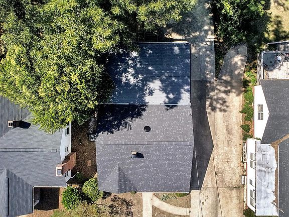 Aerial view with long driveway.