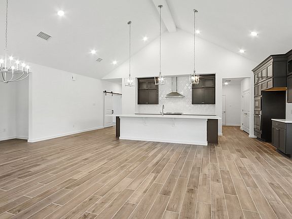 Great room with vaulted ceiling