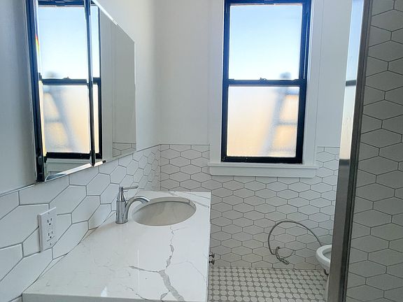 4th image of 23-82 32nd St #3
