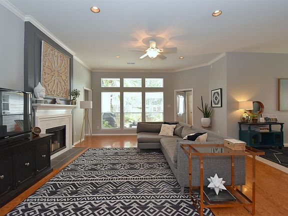 Desirable open floor plan, great natural lighting, gorgeous fireplace.