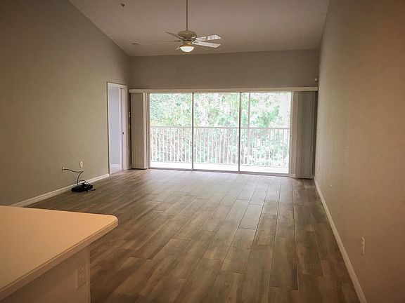 Main living area, high vaulted ceilings with private view