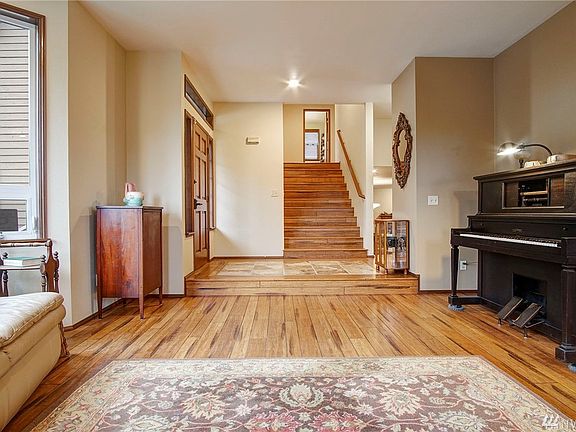Bamboo floors virtually throughout whole home except in bathrooms.  They're gorgeous and can take rugged use, yet still look spectacular!  Notice the sunken living room!
