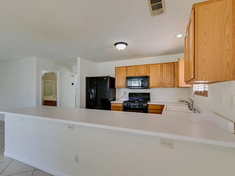 5025 Glittering Star Ct N — Photo 30