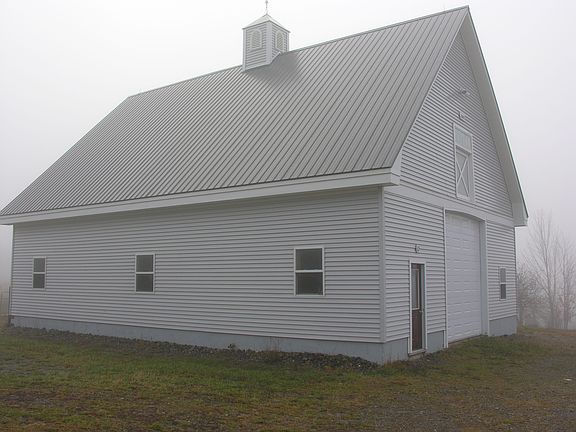 Barn with stalls; ready for horses or other livestock