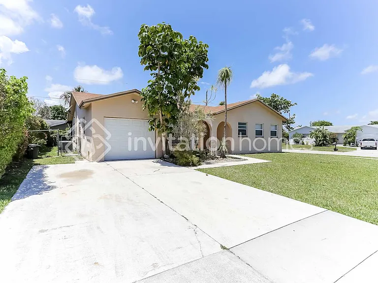 22187 SW 58th Ave — Photo 1