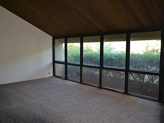 Main level - living room with floor-to-ceiling windows