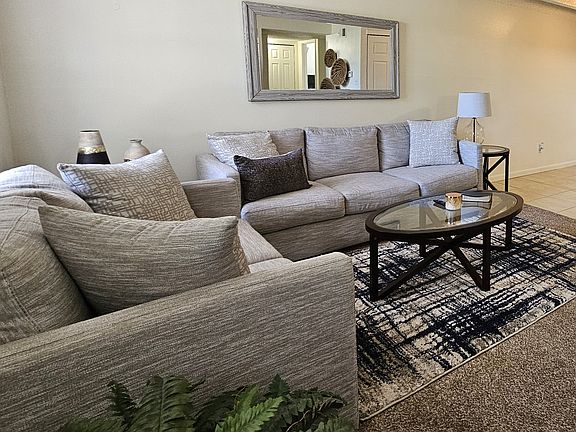 Living Room shown with Furniture. Furniture not included.