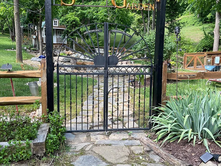 Entrance to serenity garden on acre and half fenced yard