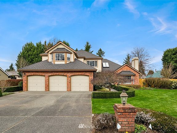 Nestled on a beautifully landscaped lot.