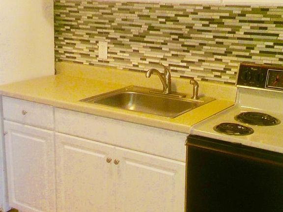 new backsplash, counter tops, kitchen fixtures