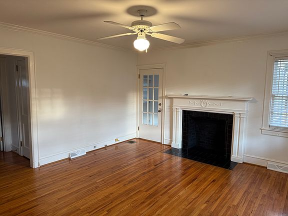 Living room. Fireplace is closed off.