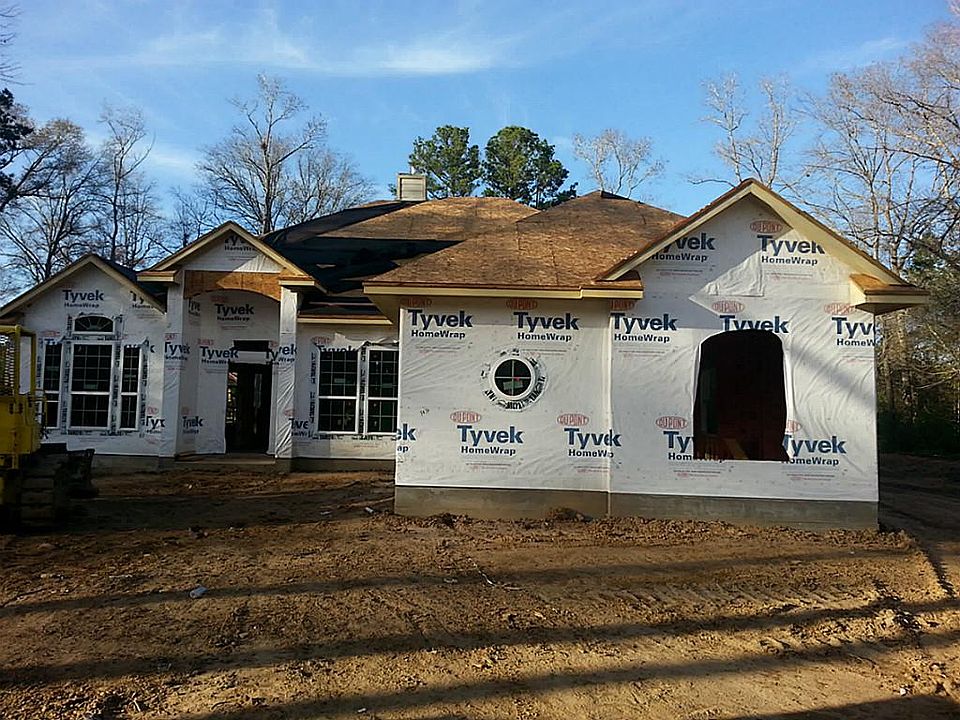 Front of house, garage on the right side