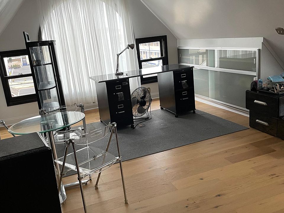 Desk & filing cabinets facing the ocean