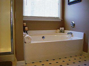 Master bath with garden tub and large walk-in closet