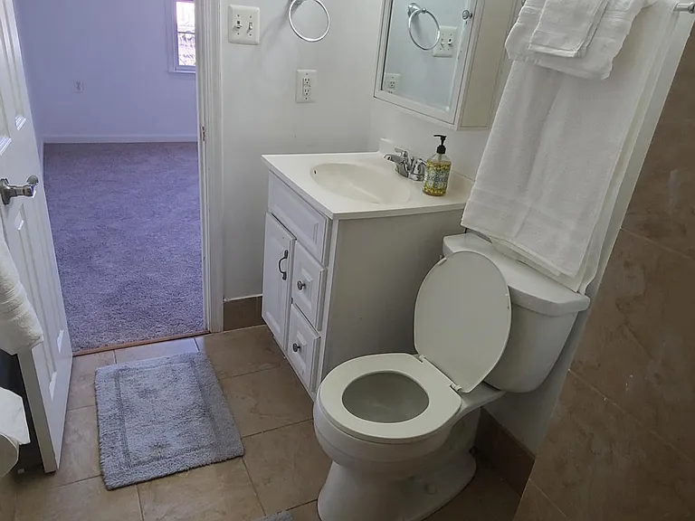 (2nd of 4 Bathrooms) master bath with stand in tiled shower.
