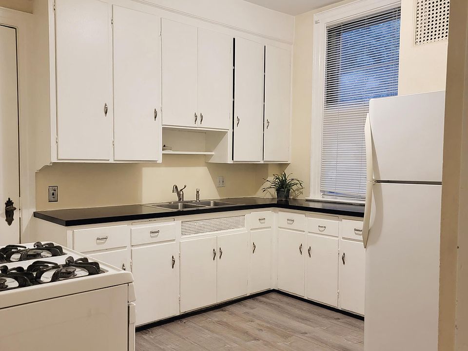 Plenty of cupboards and counter space in this kitchen. Gas stove with convection oven