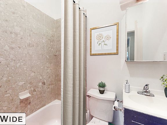 5th image of 311 E 61st St APT 3