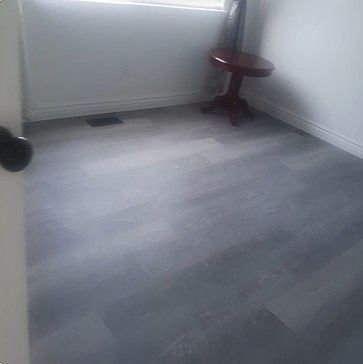 Vinyl floor with self contained bathroom.