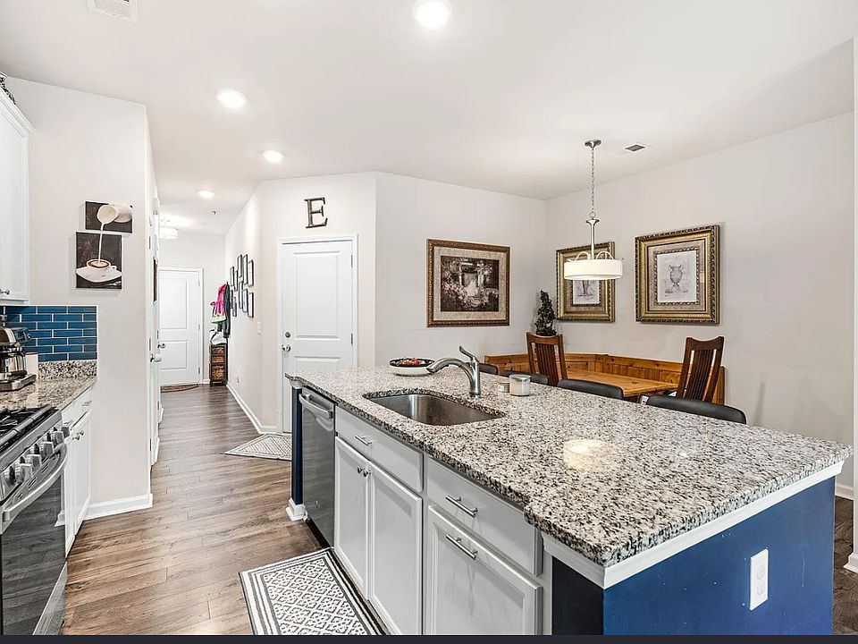 Kitchen with island and Smart Things appliances