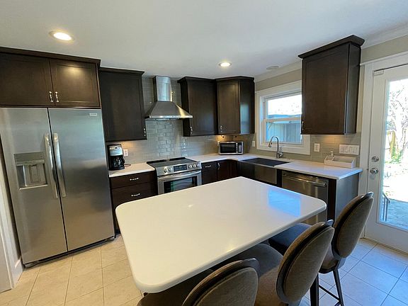 Gourmet eat in kitchen with granite counter tops
