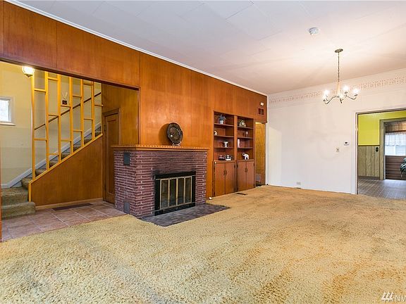 Lots of room in this over sized Living/Dining area with cozy wood burning fireplace.