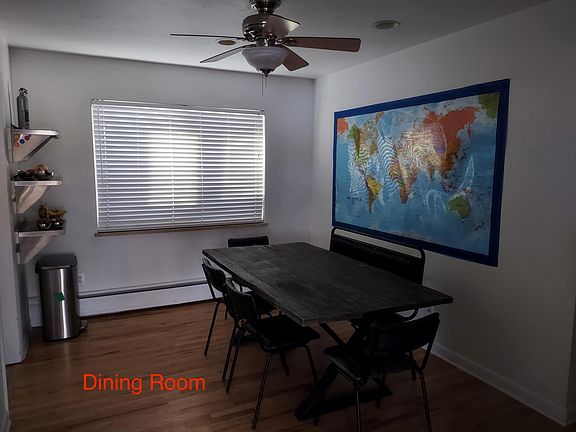 Dining room with table and seating for 6.
