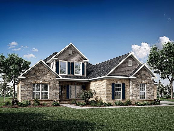The Pinewood Bonus elevation B comes with brick and stone, accents of hardie siding and complimented