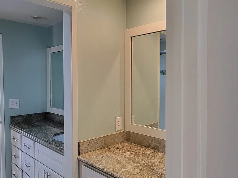 Kids' full bathroom. Granite counters