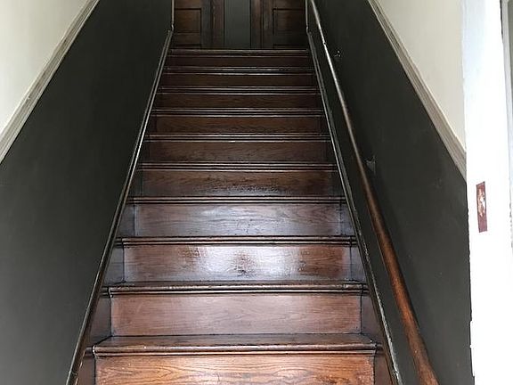 Front entrance to top floor apartments.