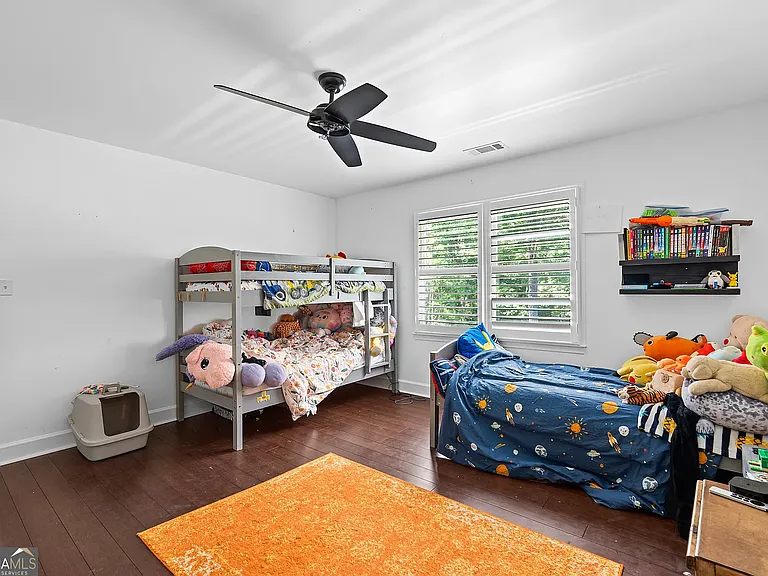Second floor rear bedroom with closet