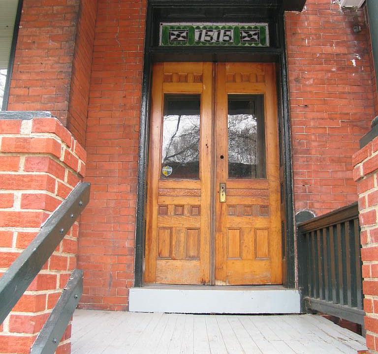 Front double door enters into a Foyer with door to the Apt #2 entering from the Foyer.