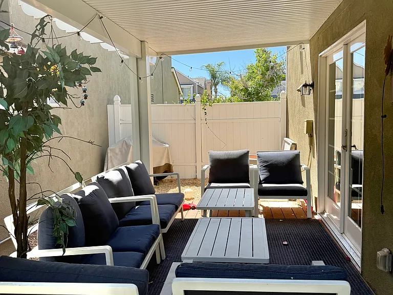 Side patio with covered roof