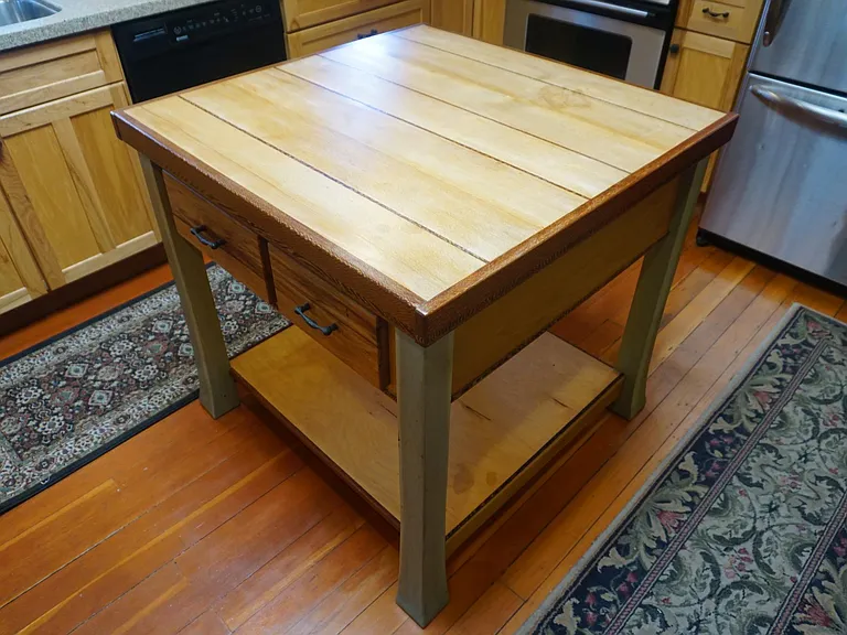 Custom (moveable) Kitchen Island below Skylight and Hanging Kitchen Rack