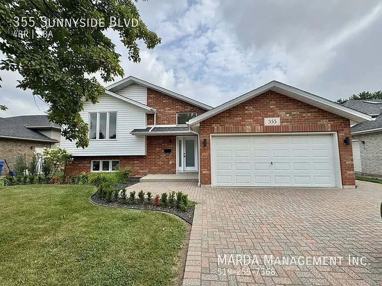 355 Sunnyside Blvd — Photo 2