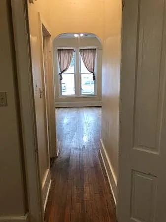 Bedroom door to hallway/ living room Unit #1 (lower unit)