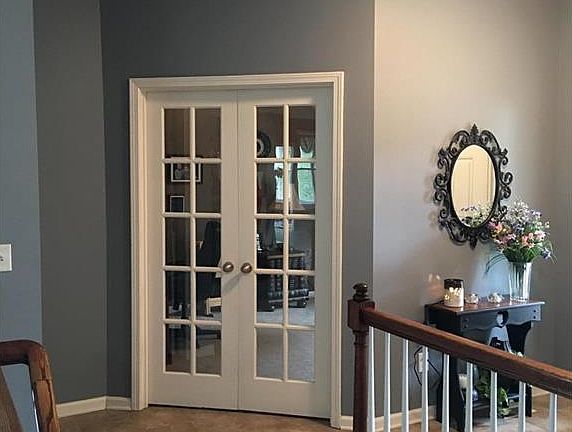 French doors leading into office area.