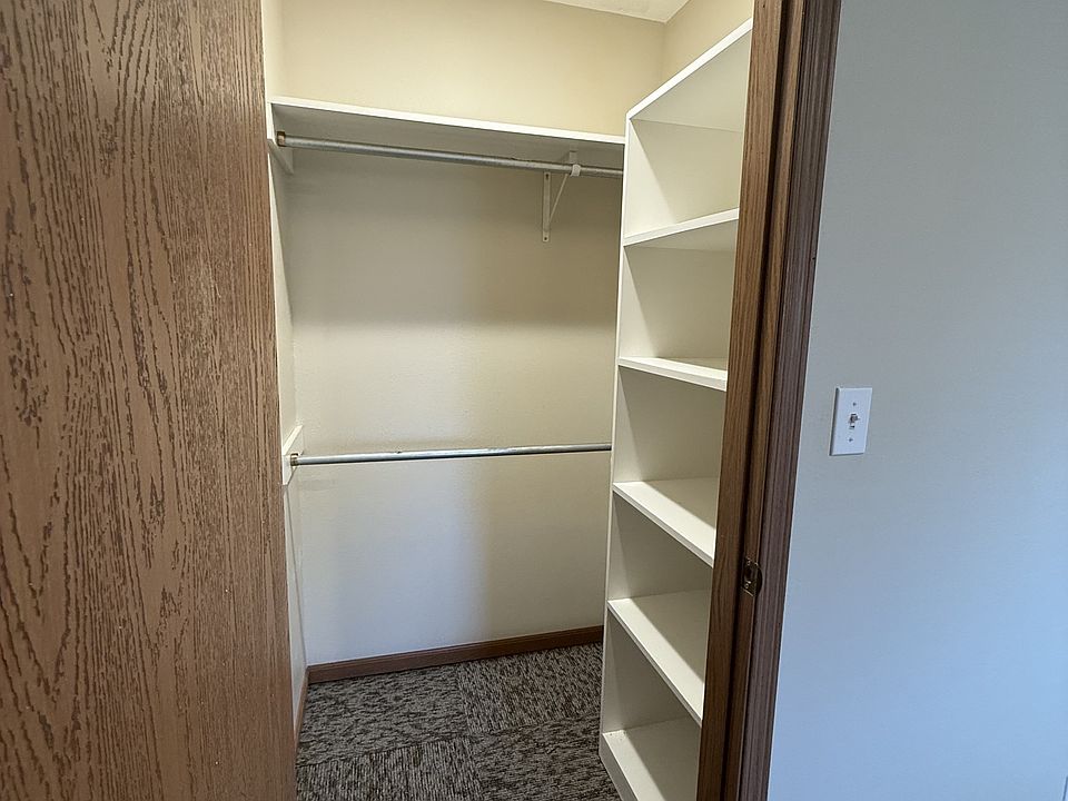 Walk-in closet with new carpet